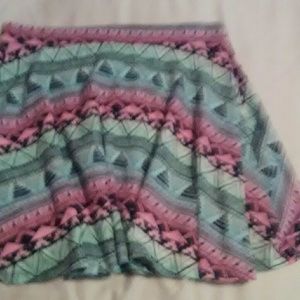 Pink, blue, and black scurt